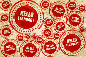Obraz premium hello february, red stamp on a grunge paper texture