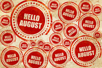 Obraz premium hello august, red stamp on a grunge paper texture