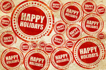 Obraz premium happy holidays, red stamp on a grunge paper texture