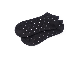 black sock with white polkadot pattern