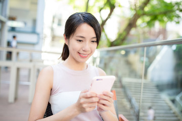 Woman looking at mobile phone