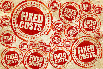 fixed costs, red stamp on a grunge paper texture