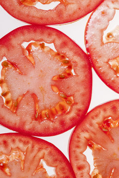 Macro image of slices of tomatoes.