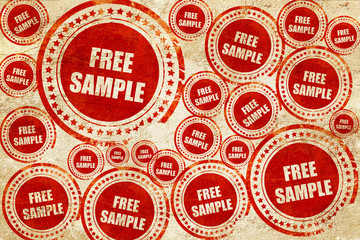 Obraz premium free sample sign, red stamp on a grunge paper texture