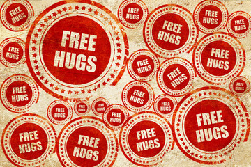 free hugs, red stamp on a grunge paper texture