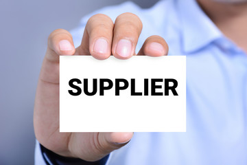 SUPPLIER word on the card shown by a man