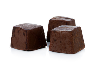 Chocolate pieces on white background