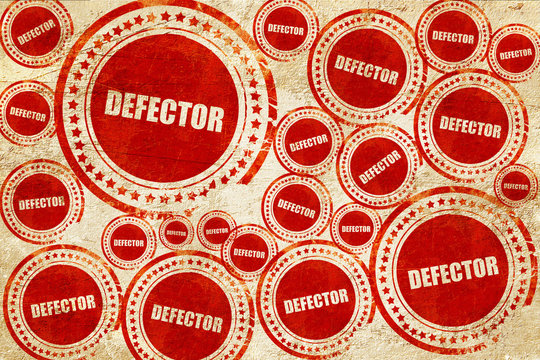 defector, red stamp on a grunge paper texture