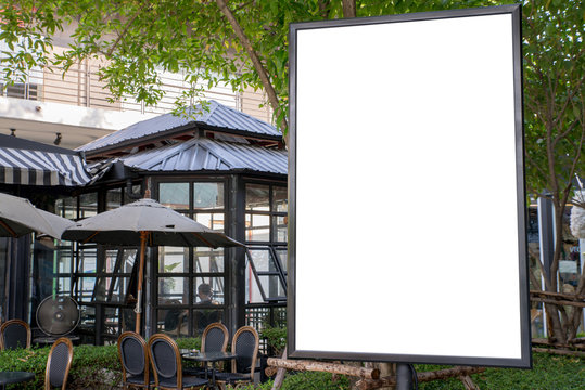 Blank outdoor white board at a sidewalk restaurants advertising.