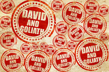david and goliath, red stamp on a grunge paper texture