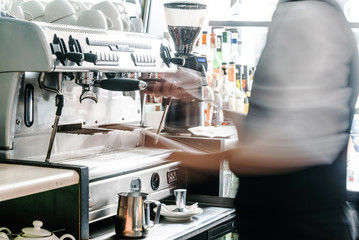 barista making coffee