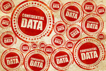 Obraz premium confidential data, red stamp on a grunge paper texture