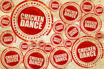 Obraz premium chicken dance, red stamp on a grunge paper texture