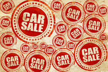 car sale, red stamp on a grunge paper texture