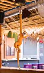 Soft toy fire red monkey hanging