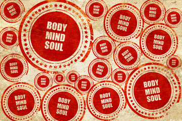 body mind soul, red stamp on a grunge paper texture