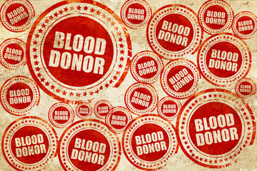 Obraz premium blood donor, red stamp on a grunge paper texture