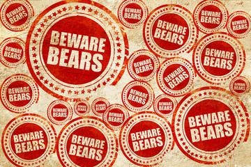 beware bears, red stamp on a grunge paper texture