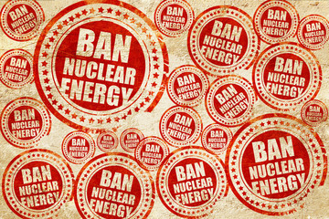 Obraz premium ban nuclear energu, red stamp on a grunge paper texture
