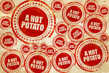 Obraz premium a hot potato, red stamp on a grunge paper texture