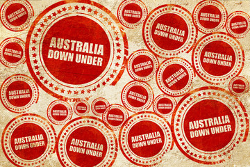 australia down under, red stamp on a grunge paper texture
