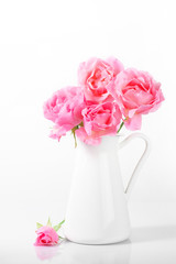 Pink roses in jug