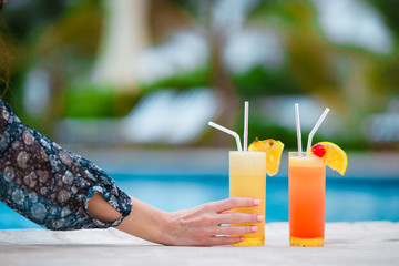 Two tasty cocktails on tropical white beach