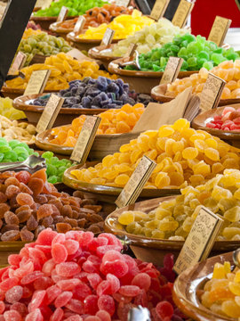 Traditional sweets (gominolas artesanas) made out of dried fruit with sugar for sale on a market stand at Majorca,Spain, Europe - overview