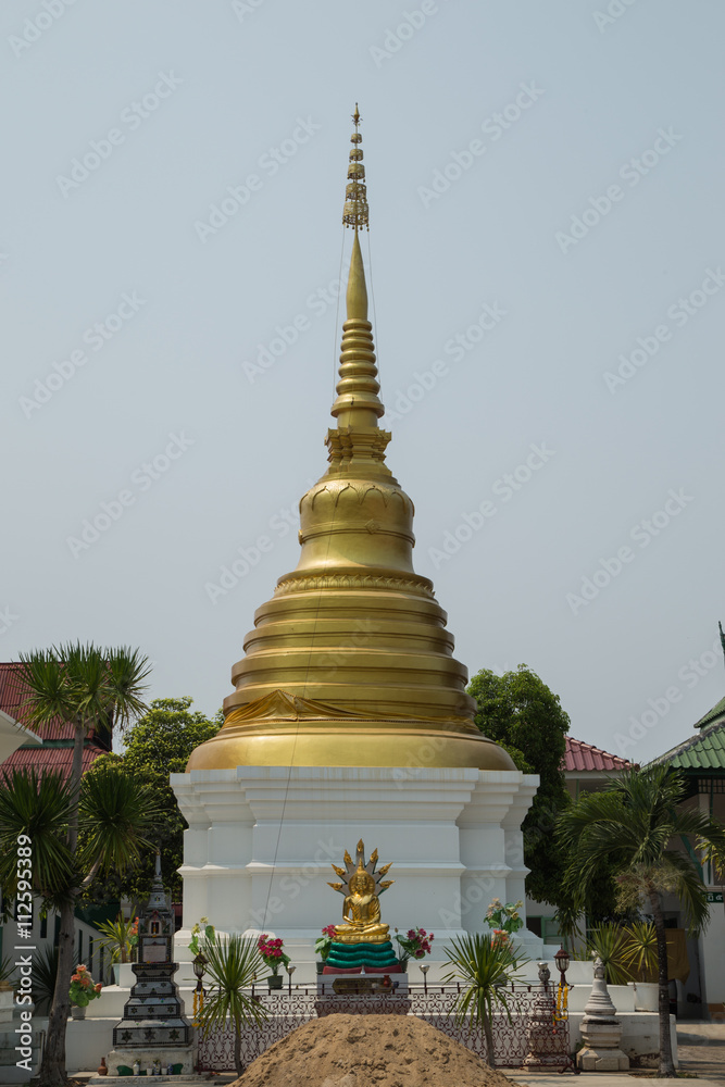 Wall mural golden and white pagoda with the blue sky, thailand