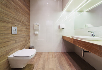 Fototapeta na wymiar Interior of modern public restroom.