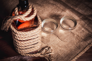 Obraz premium whiskey aged elite alcohol on wooden background