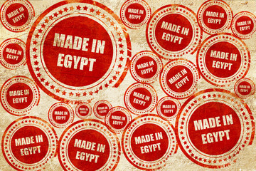 Made in egypt, red stamp on a grunge paper texture