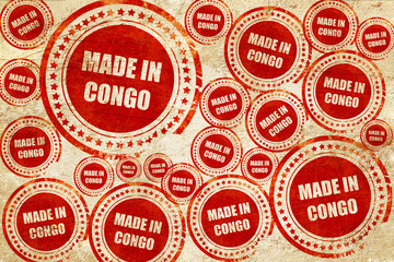 Obraz premium Made in congo, red stamp on a grunge paper texture