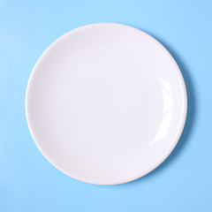 White plate on a blue background