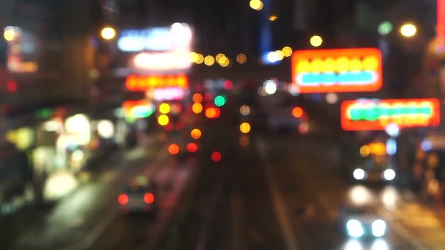 Hong Kong night street blurred video of city signs and transportations