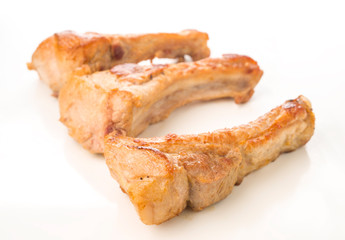 pieces of fried pork rib on white