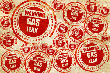 Gas leak background, red stamp on a grunge paper texture