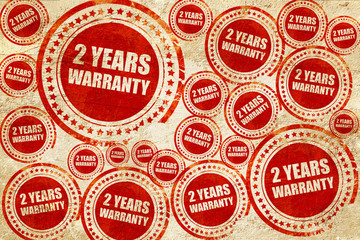 2 years warranty, red stamp on a grunge paper texture