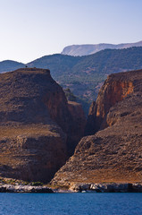 Fototapeta na wymiar Huge gorge like a big scar at south coast of Crete island, Greece