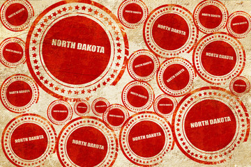 Obraz premium north dakota, red stamp on a grunge paper texture
