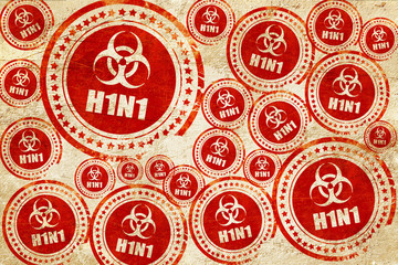 H1N1 virus concept background, red stamp on a grunge paper textu