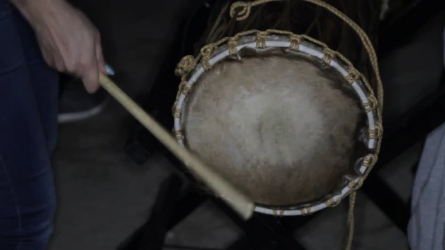 performance of ritual dance on classical African drums

