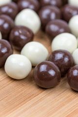 Black and white chocolate candies background