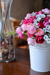 Fake flower on wood table