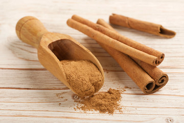 cinnamon on a wooden background