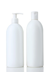 plastic bottle with a shampoo or singing tools on white isolated background