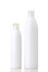 plastic bottle with a shampoo or singing tools on white isolated background