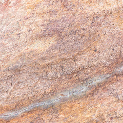 Surface of the marble with brown tint, stone texture and background. Imagination of the nature.