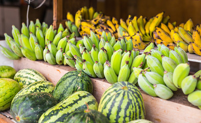 Fruit market with various colorful fresh fruits and vegetables