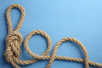 knot on blue wooden background